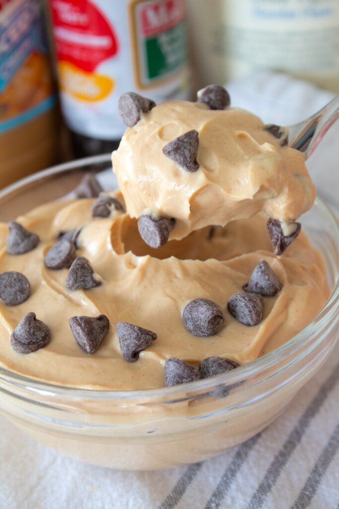 spoon lifting greek yogurt cookie dough