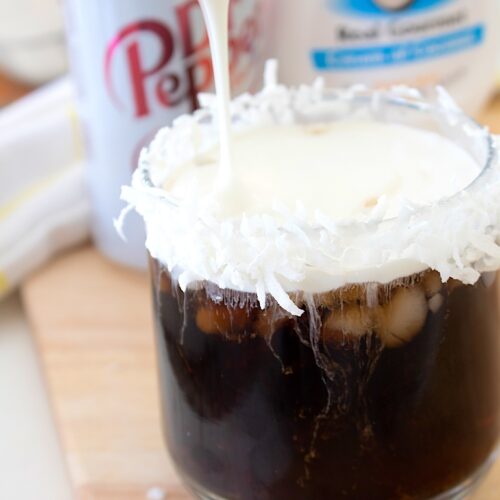 dirty Dr Pepper in a glass with cloud foam