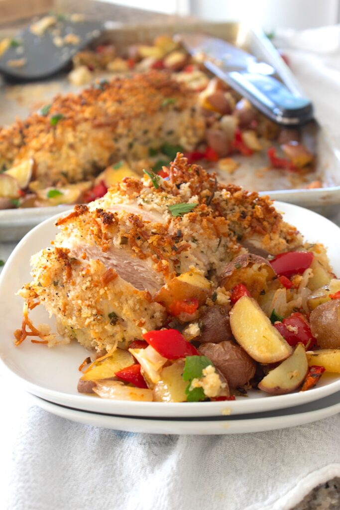 parmesan crunch chicken dinner with potatoes on a plate