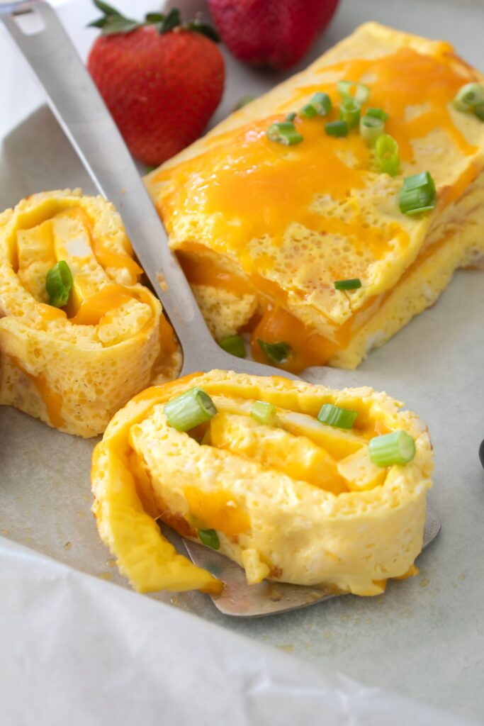 overhead view of omelette roll on a sheet pan